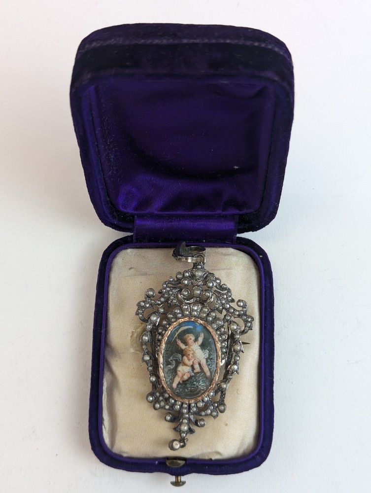 PENDENTIF-BROCHE en argent (950) de forme...