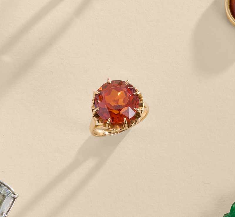 BAGUE en or (750) et pierre orange fabri...