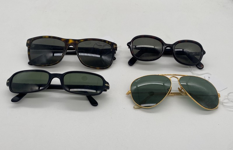 LOT DE QUATRE PAIRE DE LUNETTES Ray Ban,...